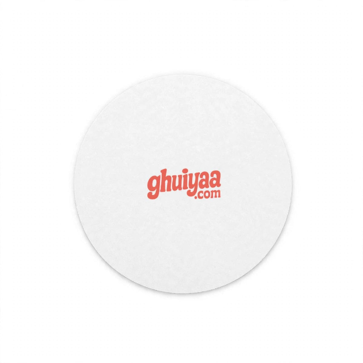 White circle mouse pad with Ghuiyaa.com logo on a minimal desk setup