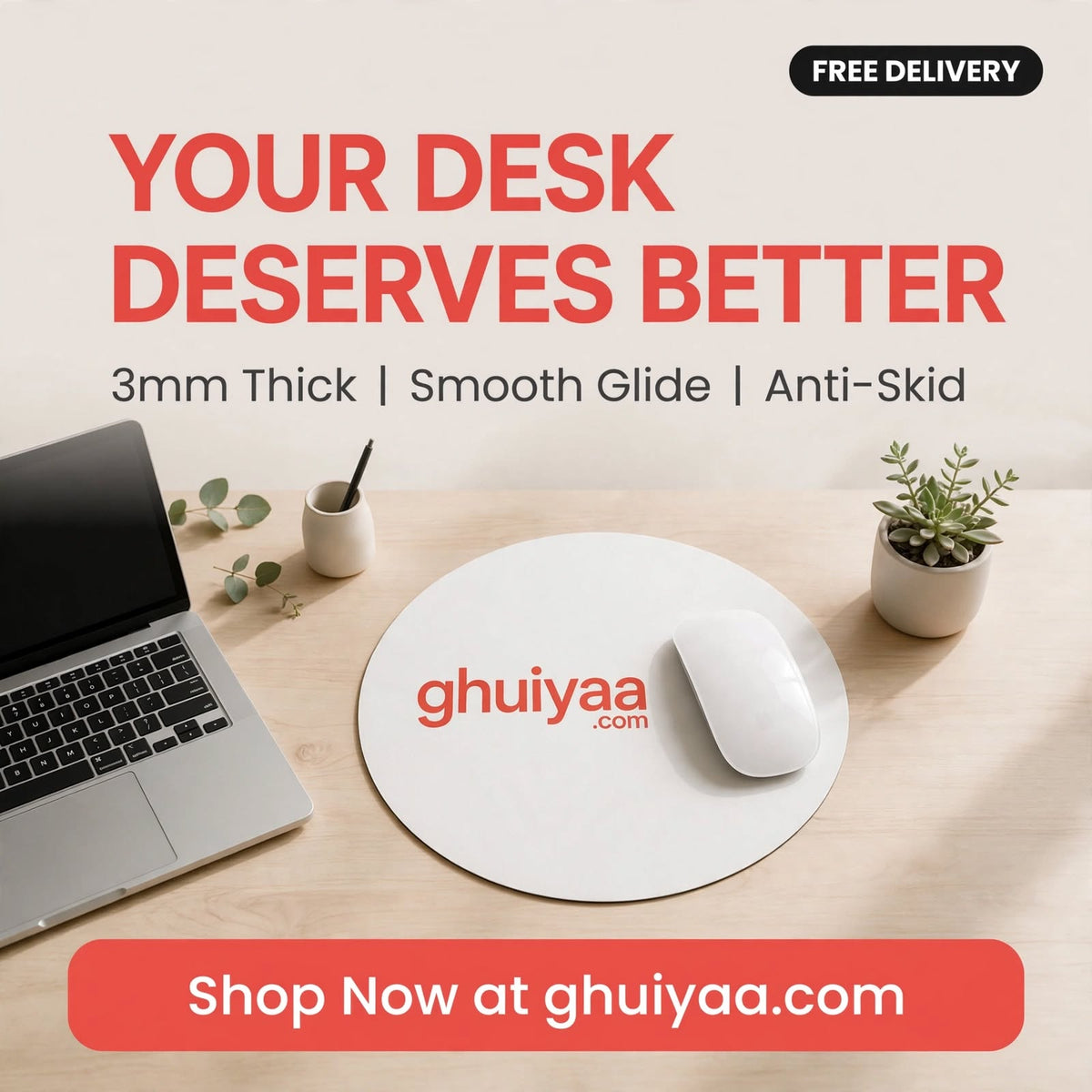 White circle mouse pad with Ghuiyaa.com logo on a minimal desk setup