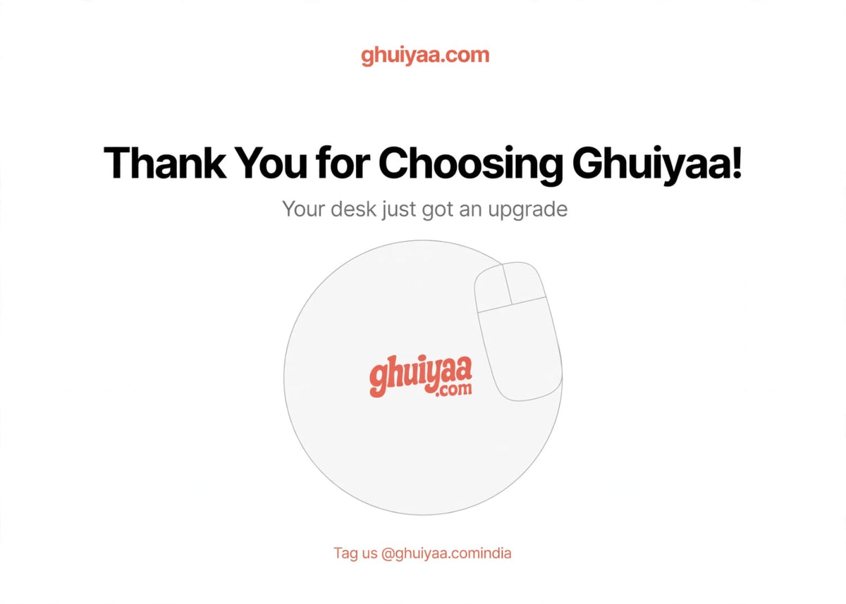 White circle mouse pad with Ghuiyaa.com logo on a minimal desk setup