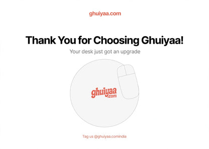White circle mouse pad with Ghuiyaa.com logo on a minimal desk setup